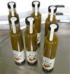 Wrap around labelling machine with security seal label for bottles and jars